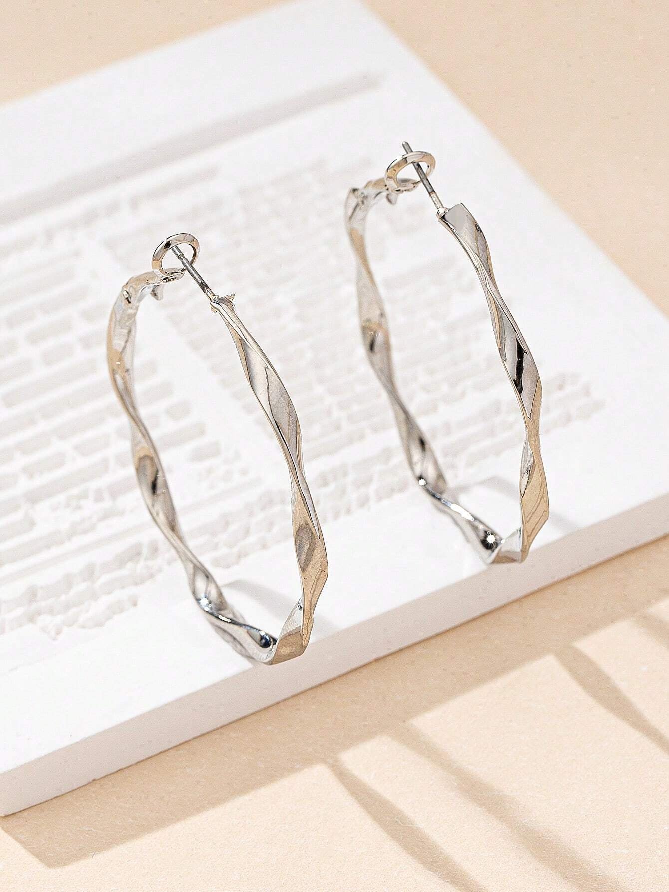 1 paire de boucles d'oreilles