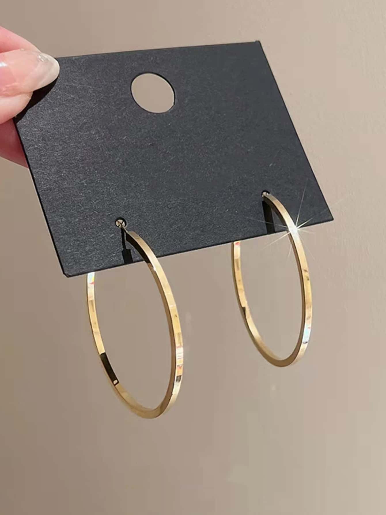 1 paire de boucles d'oreilles