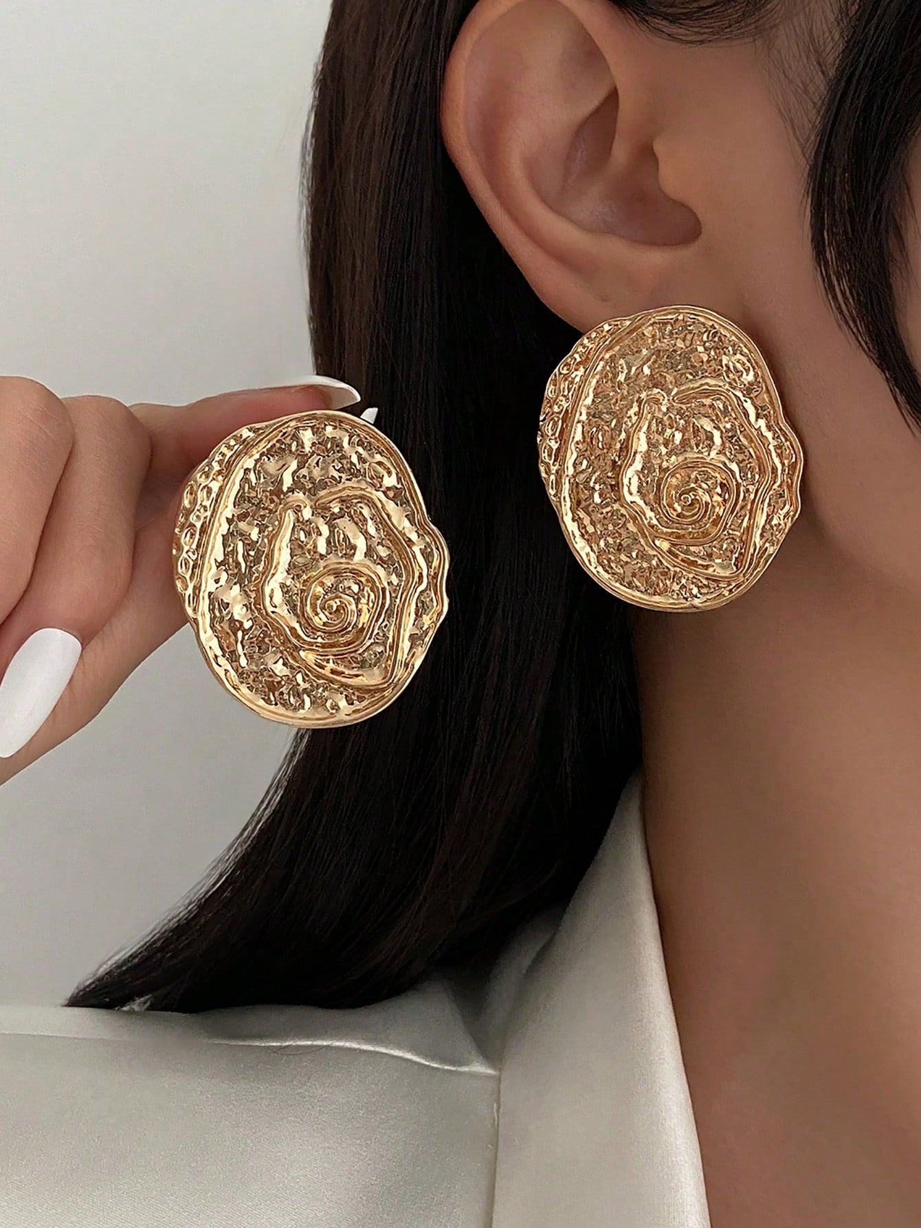 1 paire de boucles d'oreilles rondes