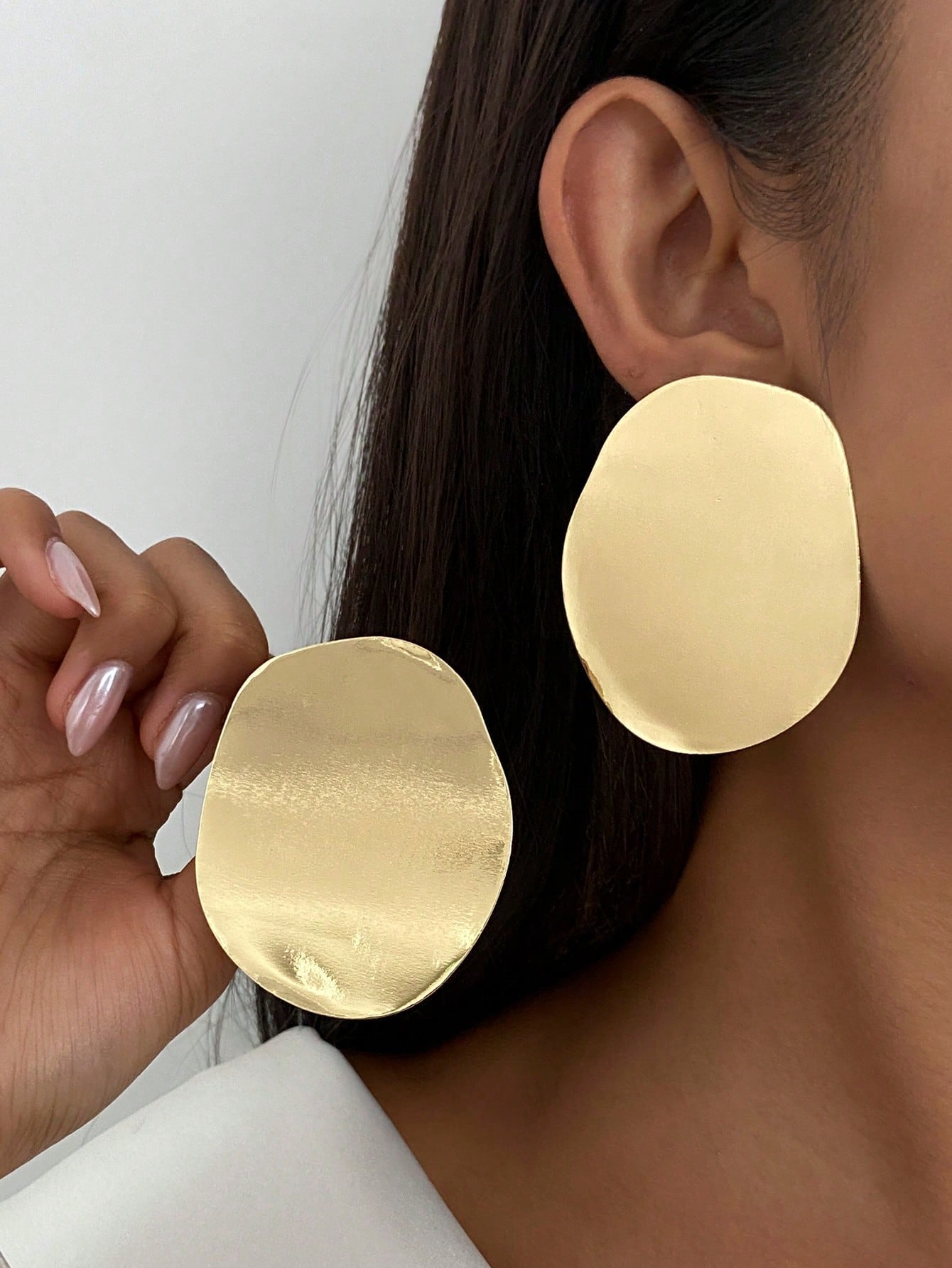 1 paire de boucles d'oreilles rondes