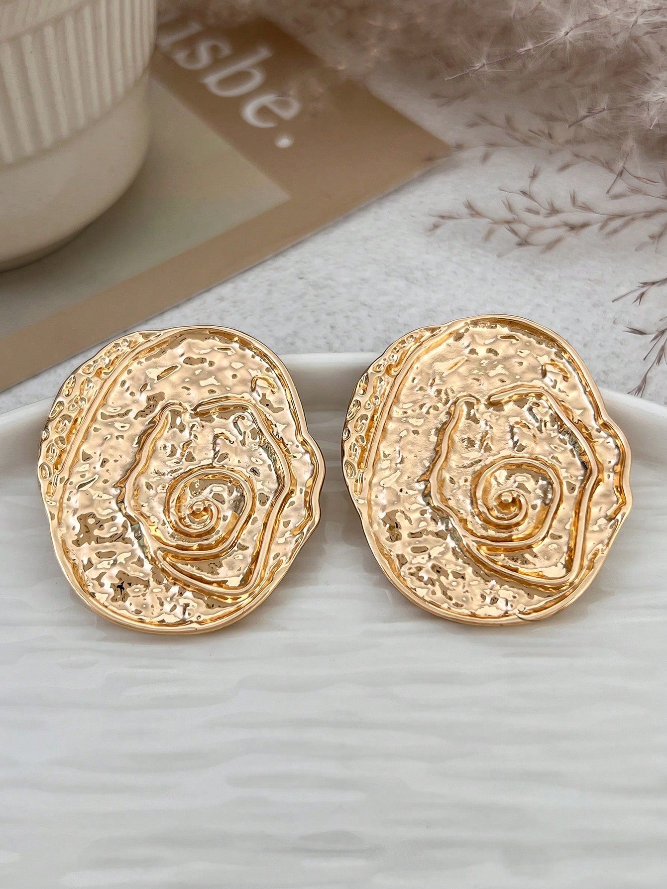 1 paire de boucles d'oreilles rondes