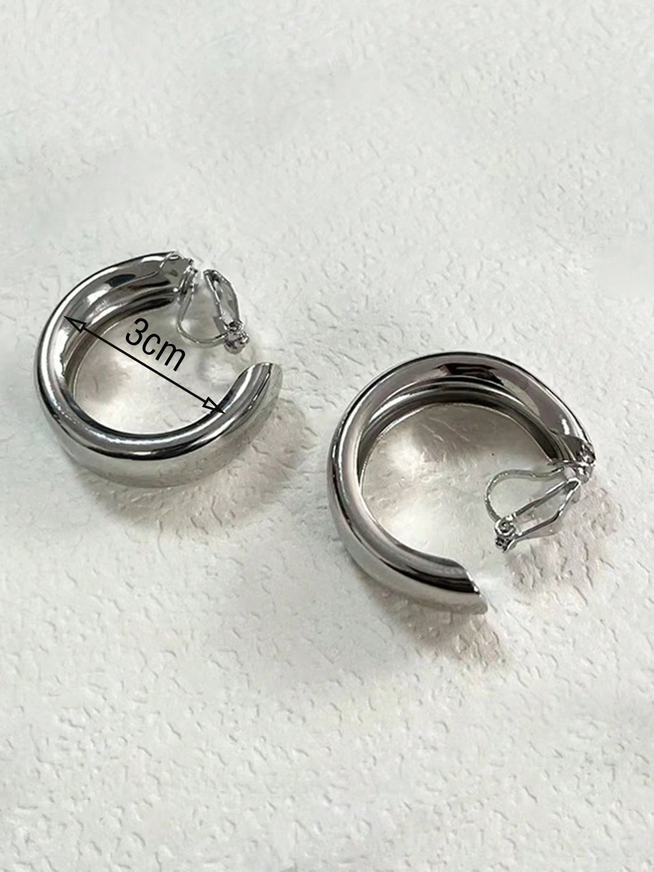 1 paire de boucles d'oreilles