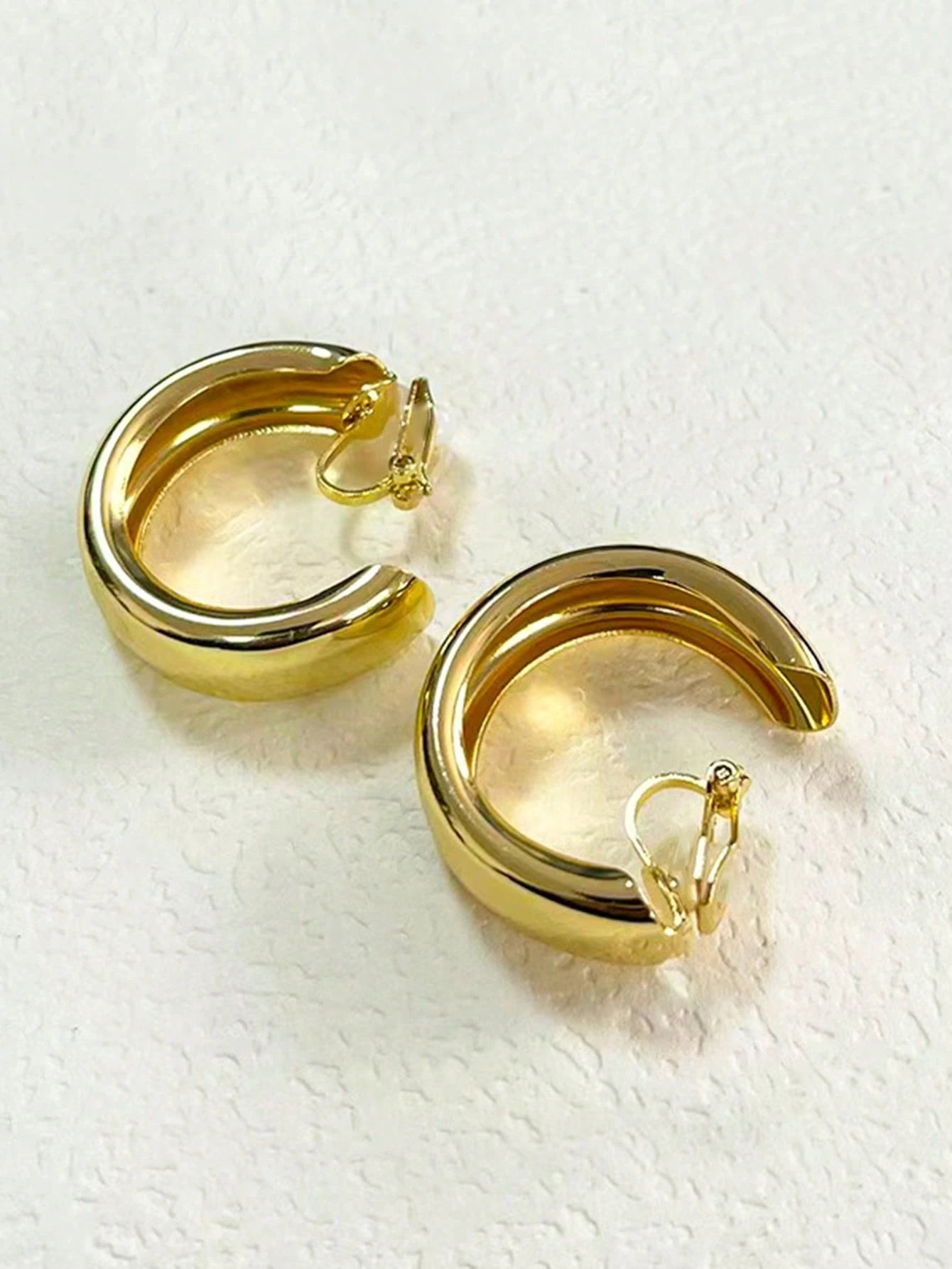 1 paire de boucles d'oreilles