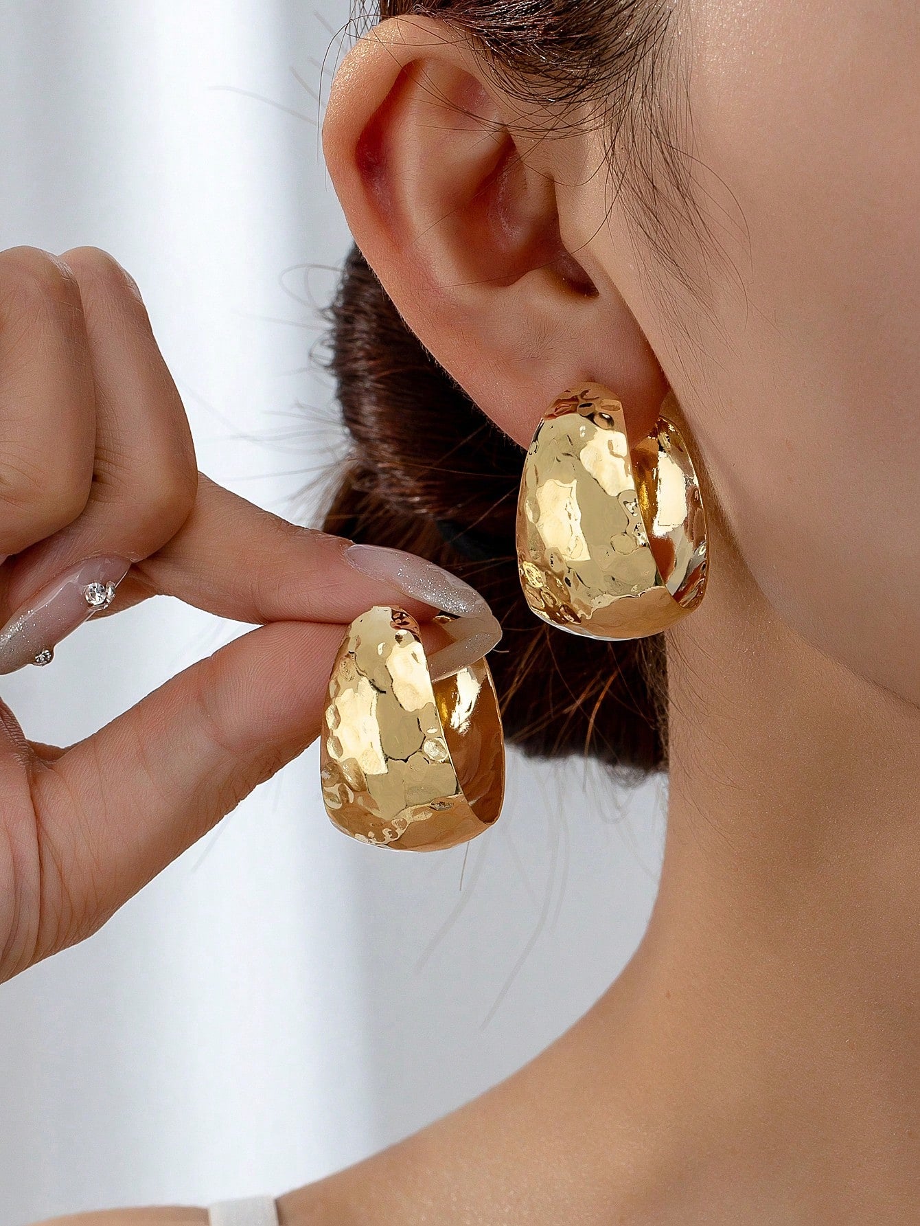 1 paire de boucles d'oreilles