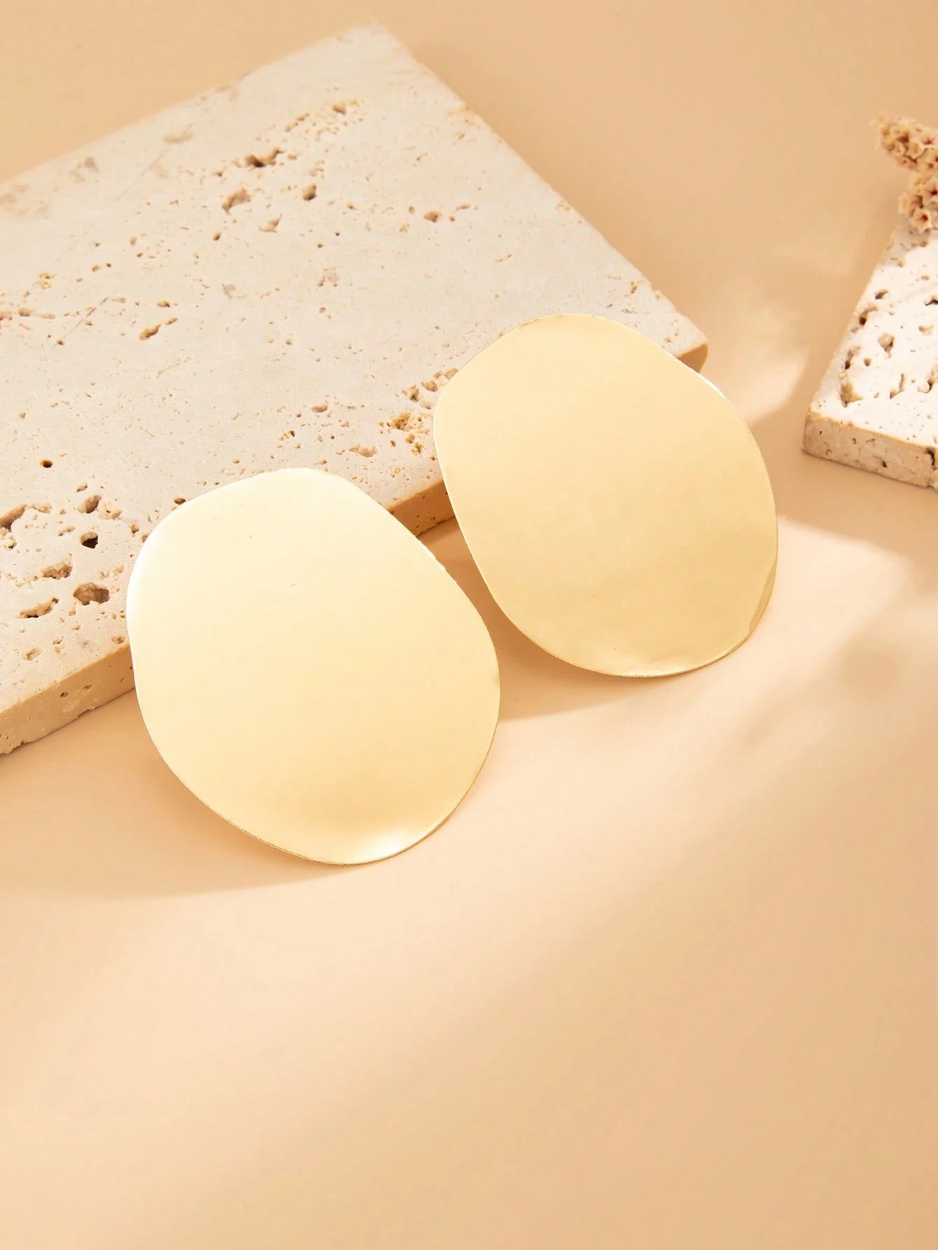 1 paire de boucles d'oreilles rondes