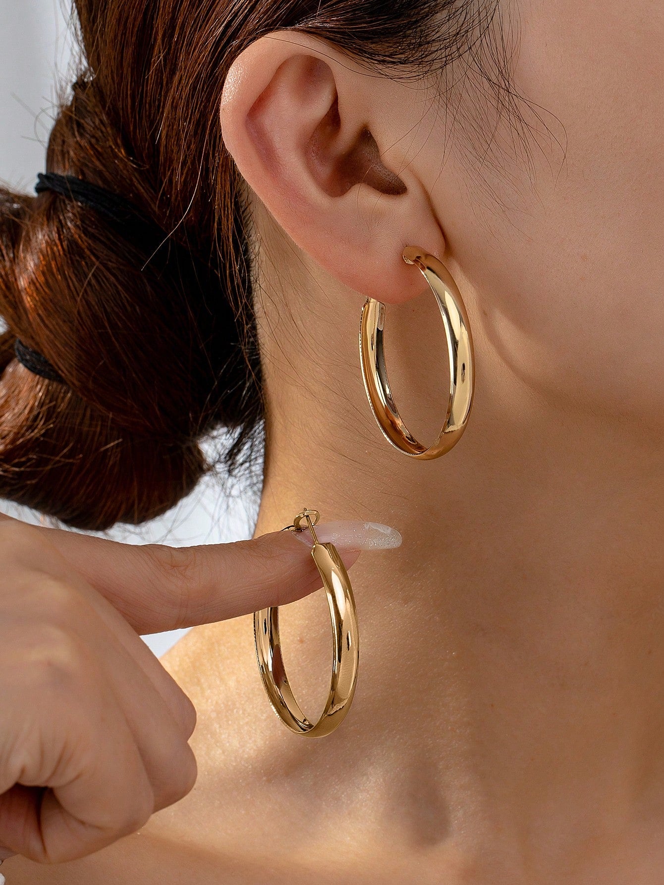 1 paire de boucles d'oreilles