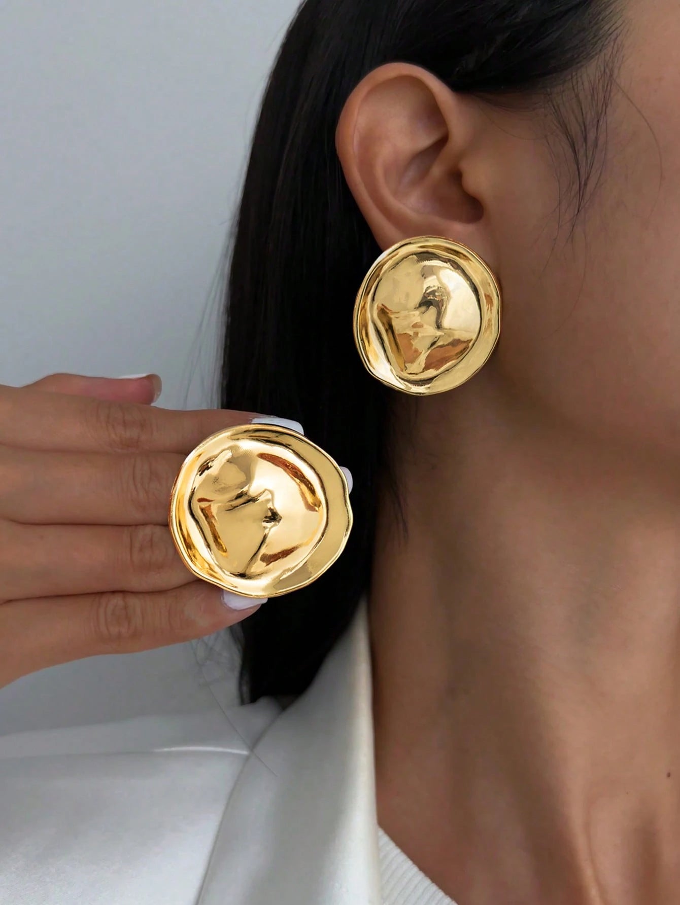 1 paire de boucles d'oreilles rondes